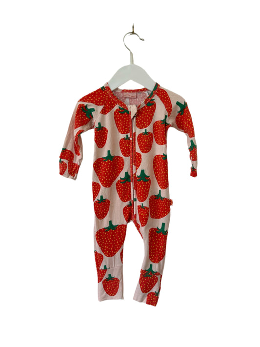 Children's onesie with strawberry pattern on a white background